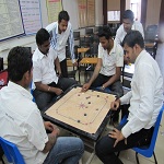 Students Playing Carrom